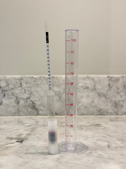 Hydrometer och Mätglas